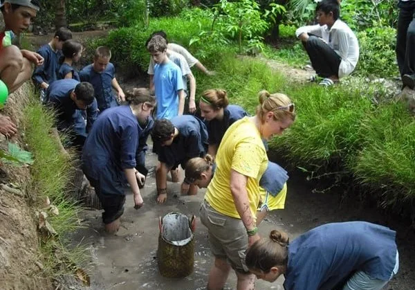 Slapping ditches to catch fish